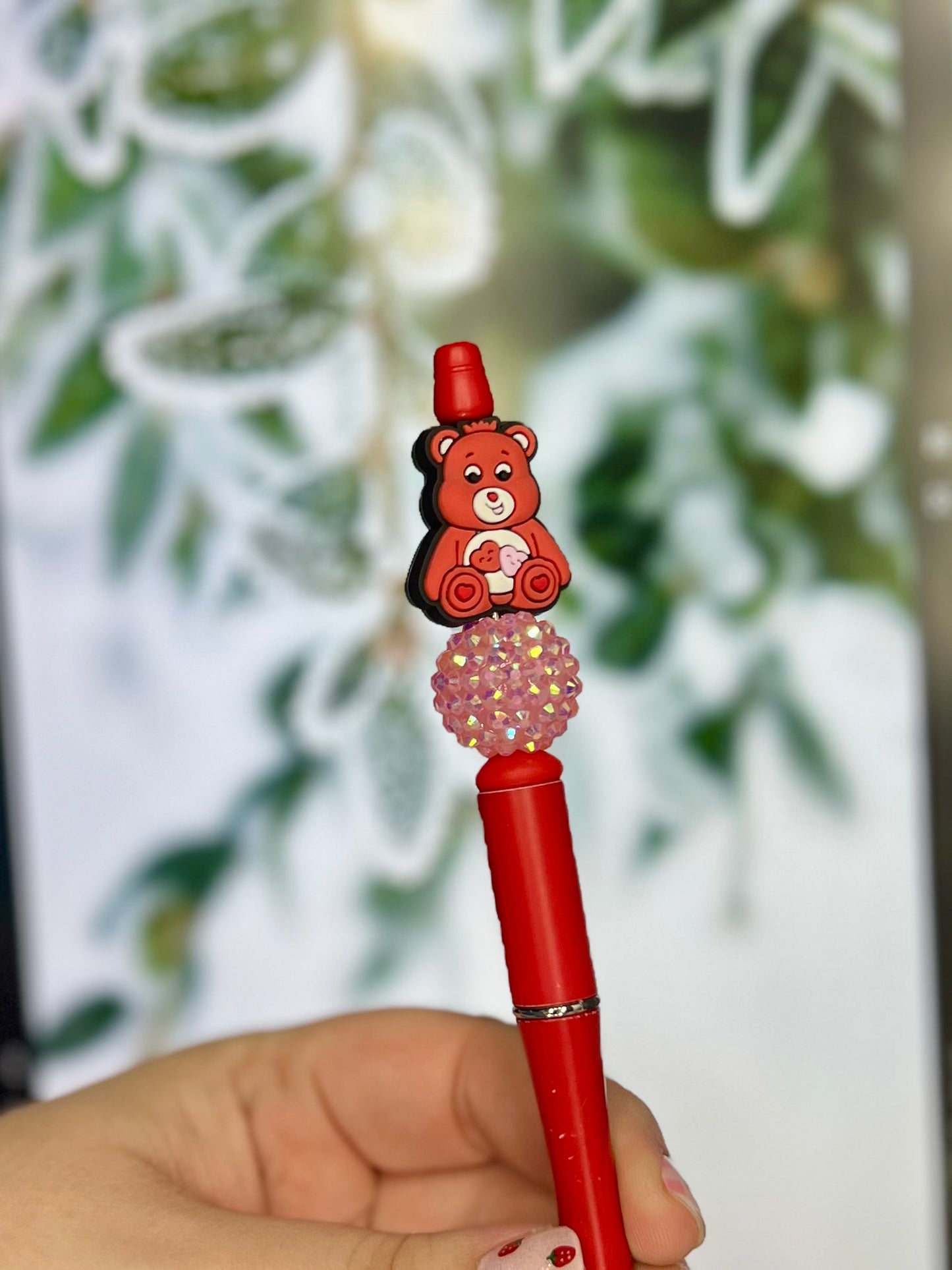 Red/orange care bear pen