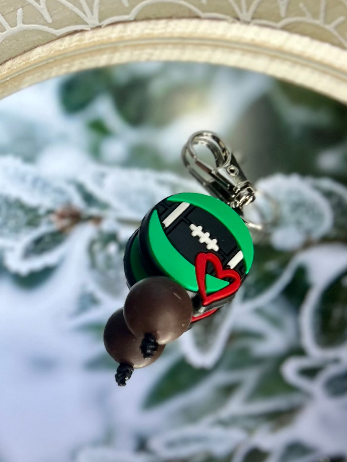 Football heart zipper pull