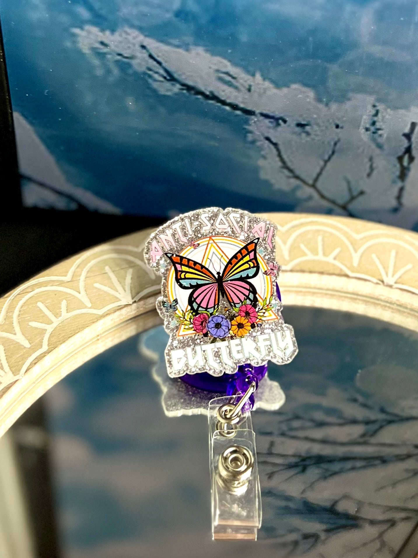 Antisocial butterfly badge reel