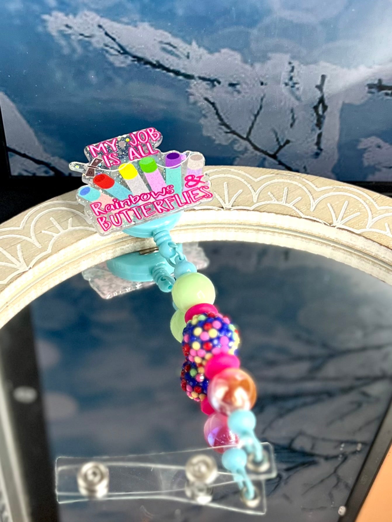 My job is all rainbows and butterflies badge reel