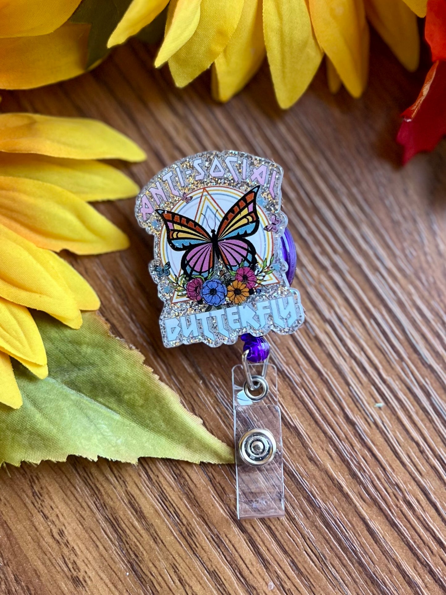 Ant-Social Butterfly Badge Reel