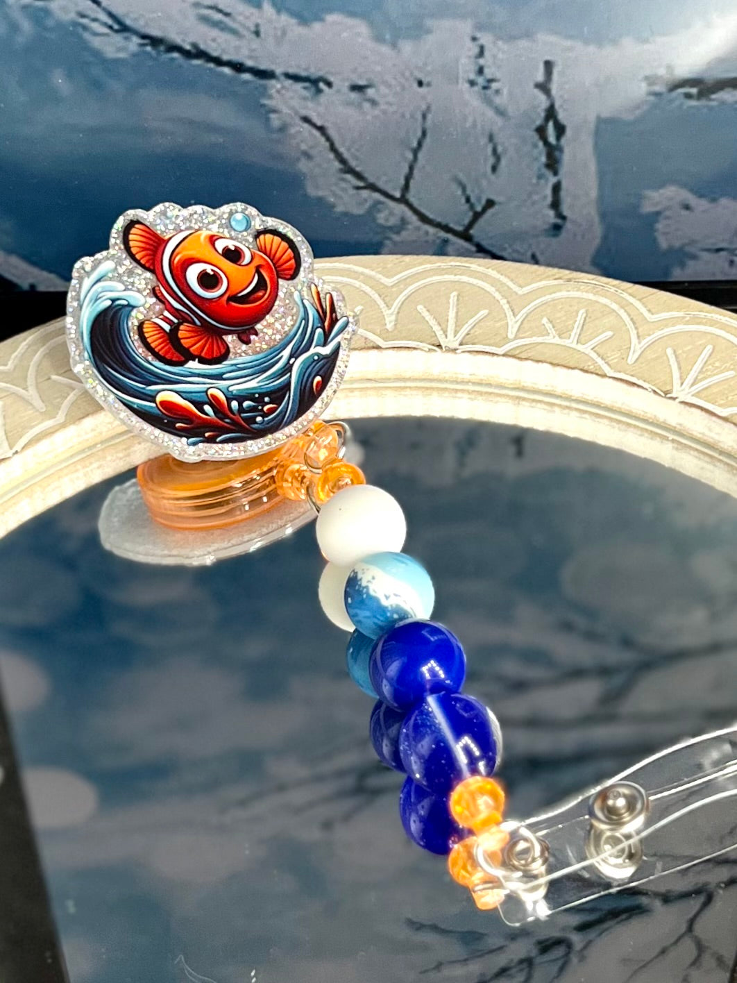 Nemo badge reel