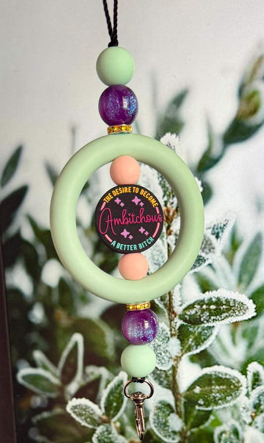 Am-bitch-ous car charm