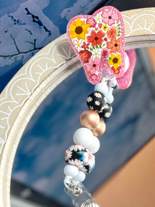 Tooth badge reel