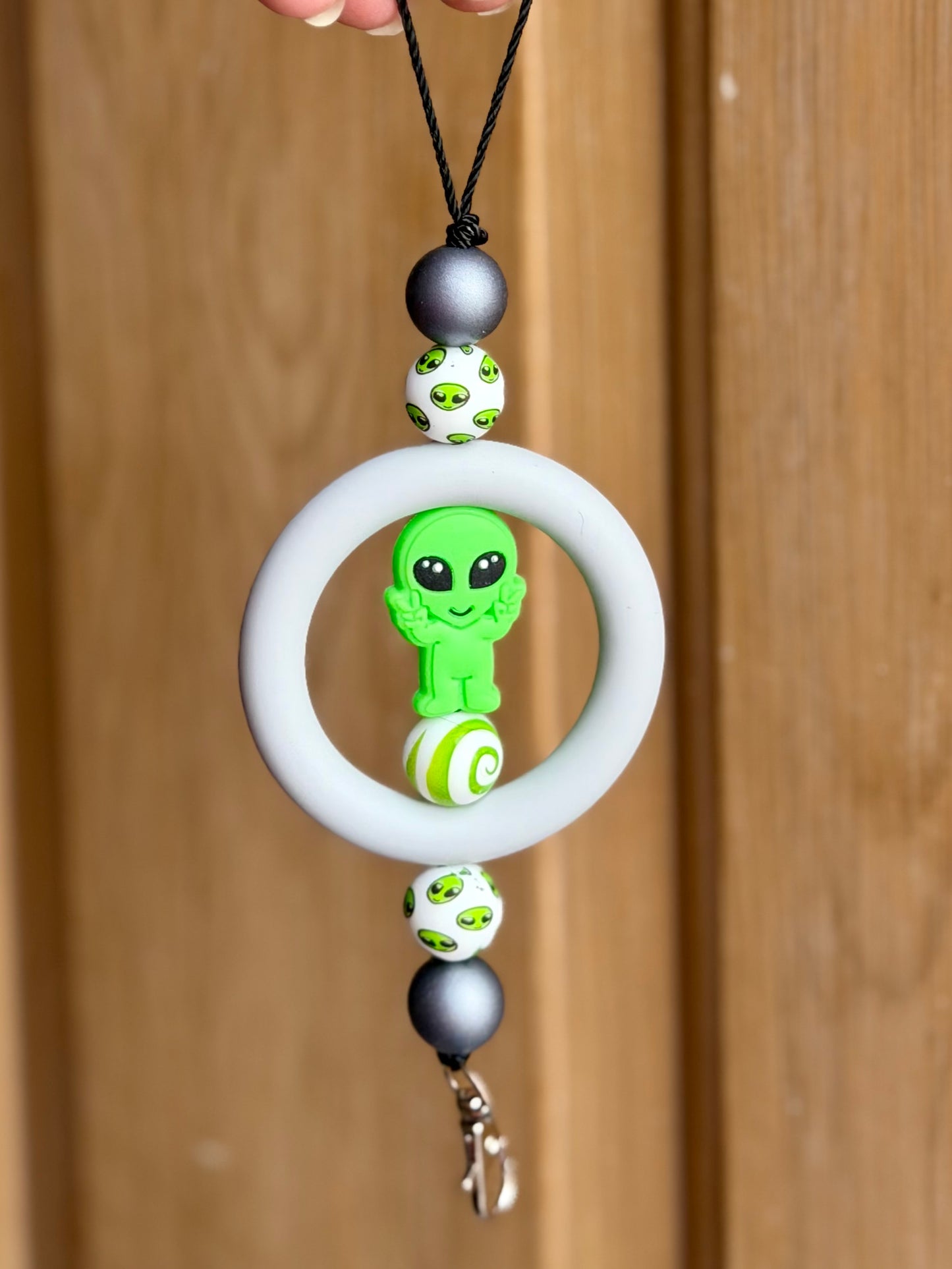 Green alien car charm