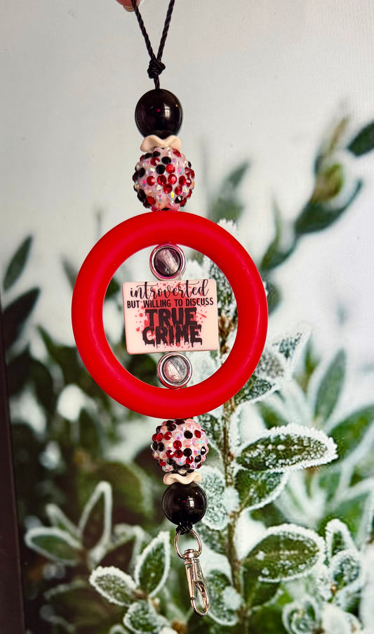 Introverted but true crime car charm